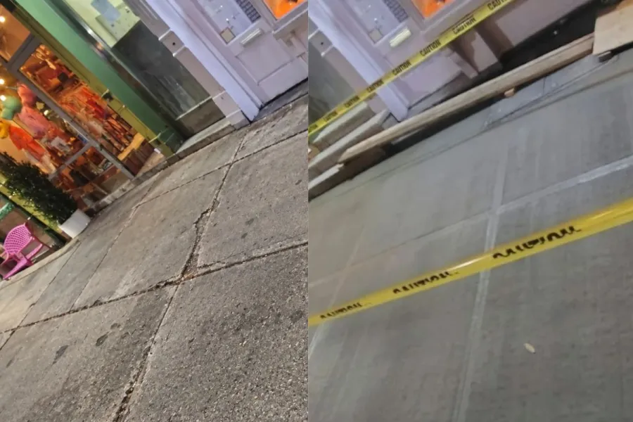 Simulated damaged sidewalk beside newly poured concrete outside Baya Bar at 232 Mulberry Street, Nolita.