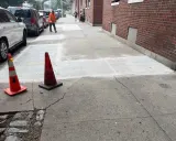 How a 26-Unit Sunnyside Rental Building Cleared Its Sidewalk Violation Without Losing the Street Tree