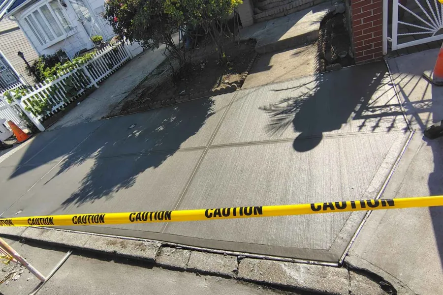 Completed sidewalk replacement in Jamaica Hills, Queens